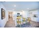 Open kitchen layout boasts a granite island with bar stools and modern appliances at 7461 Michelle Rd, Rocky Mount, NC 27803