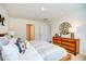 Bedroom featuring decorative accents, a wood dresser, and ample natural light at 7461 Michelle Rd, Rocky Mount, NC 27803