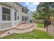 A backyard with a patio and seating area at 8517 Evans Mill Pl, Raleigh, NC 27613