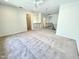 Open bonus room with neutral carpet, providing a spacious area for relaxation and activities at 8813 Moss Glen Dr, Raleigh, NC 27617
