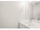 Clean and modern bathroom with a vanity, sink, and a large mirror at 900 Borage Dr, Wake Forest, NC 27587