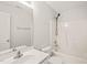 This bathroom offers a single sink vanity, a mirror, toilet and tub-shower combo at 900 Borage Dr, Wake Forest, NC 27587
