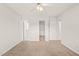 Bright bedroom with carpeted floors and multiple closets for ample storage at 900 Borage Dr, Wake Forest, NC 27587