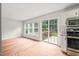Bright breakfast nook features sliding glass door access to the rear deck at 900 Borage Dr, Wake Forest, NC 27587