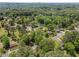 The sprawling neighborhood includes a property with mature trees and convenient access to nearby amenities at 903 Da Vinci St, Durham, NC 27704