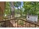 View from deck to backyard including shed and back of nearby homes at 903 Da Vinci St, Durham, NC 27704