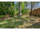 View of the backyard featuring the shed and back of the home at 903 Da Vinci St, Durham, NC 27704