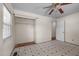 Bedroom with closet, ceiling fan, and two windows at 903 Da Vinci St, Durham, NC 27704