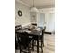 Cozy dining area with a table set for four and filled with natural light at 940 Pamela Ln, Rocky Mount, NC 27803
