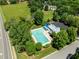 Enjoy access to a community pool with ample seating and shade, perfect for hot summer days at 100 Michaels Way, Chapel Hill, NC 27516