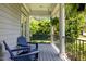 Relax on this beautiful porch with comfortable seating and serene views at 100 Michaels Way, Chapel Hill, NC 27516