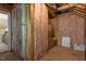 Unfinished attic space with insulation and exposed wood framework showing potential for customization and ample storage at 1009 Bearglades Ln, Raleigh, NC 27615