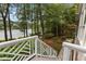 Scenic backyard with lake view, complemented by well-maintained landscaping and access to the water, perfect for outdoor enjoyment at 1009 Bearglades Ln, Raleigh, NC 27615