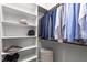 Organized walk-in closet with shelving and hanging space, perfect for storage at 1009 Bearglades Ln, Raleigh, NC 27615