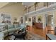 Spacious living room with an open floor plan, hardwood floors, and views to other rooms in the home at 1009 Bearglades Ln, Raleigh, NC 27615