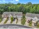 Beautiful aerial view of the townhomes nestled amongst the trees at 1022 Flagler St, Durham, NC 27713