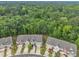 A lovely aerial view of the community with lots of surrounding trees at 1022 Flagler St, Durham, NC 27713