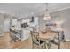 Dining area with a view to the kitchen with a breakfast bar at 1022 Flagler St, Durham, NC 27713