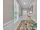 Bright hallway features natural light, fresh paint, and a decor table at 1022 Flagler St, Durham, NC 27713