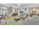 Bright and airy living room that transitions to the kitchen and entry hall at 1022 Flagler St, Durham, NC 27713