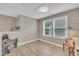 Versatile loft space with hardwood floors, natural light, and cozy seating at 1022 Flagler St, Durham, NC 27713