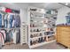 This is the home's walk-in closet with plenty of space and shelving at 1022 Flagler St, Durham, NC 27713