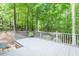 Spacious deck overlooking a private, wooded backyard at 103 Harrington Pt, Chapel Hill, NC 27516