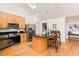 Modern kitchen with stainless steel appliances, granite countertops, and a central island at 103 Harrington Pt, Chapel Hill, NC 27516