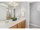 Bathroom featuring double sink vanity with modern fixtures and a standing shower at 103 Rama Ct, Morrisville, NC 27560