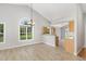 Bright dining area featuring wood laminate floors, neutral paint, and lots of natural light at 103 Rama Ct, Morrisville, NC 27560