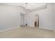 Large primary bedroom featuring neutral paint, a ceiling fan, and access to ensuite bathroom at 103 Rama Ct, Morrisville, NC 27560