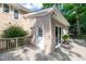 Backyard deck featuring a door and large sliding glass windows with chairs at 107 Ivy Hollow Ct, Morrisville, NC 27560
