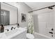 Clean bathroom with a shower/tub combination, a marble vanity, and a neutral color scheme at 107 Ivy Hollow Ct, Morrisville, NC 27560