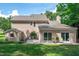 Exterior of a two-story house with a walk-out deck, sliding glass doors, and green lawn at 107 Ivy Hollow Ct, Morrisville, NC 27560