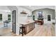 Open floor plan showcases the kitchen with a butcher block island and dining room at 107 Ivy Hollow Ct, Morrisville, NC 27560