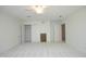Bright bedroom with neutral carpet, a ceiling fan, and access to closet and hallway at 107 Silo Dr, Chapel Hill, NC 27514