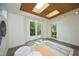 Bonus room with natural light, skylights, and access to the backyard at 107 Silo Dr, Chapel Hill, NC 27514