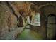 Unique cave with carvings and stone steps leading to an outdoor view, showcasing unique architectural design at 107 Silo Dr, Chapel Hill, NC 27514