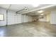 Spacious garage with white doors and open area for parking multiple vehicles at 107 Silo Dr, Chapel Hill, NC 27514