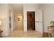 Hallway featuring a residential elevator, neutral paint, and hardwood floors at 107 Silo Dr, Chapel Hill, NC 27514