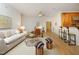 Bright and airy living room with hardwood floors, comfortable seating, and a seamless open layout at 107 Silo Dr, Chapel Hill, NC 27514