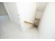 Bright staircase with neutral carpet, and a wood handrail leading to the main level at 107 Silo Dr, Chapel Hill, NC 27514