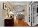 Stylish foyer with gleaming hardwood floors and open views into other rooms at 112 Tanoak Ct, Durham, NC 27703