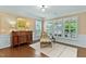 Living room with chair and ottoman and window view at 112 Tanoak Ct, Durham, NC 27703