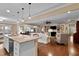Open floor plan showing the kitchen, dining area, and living room with fireplace at 112 Tanoak Ct, Durham, NC 27703