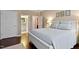 Comfortable main bedroom boasts hardwood floors and ensuite bathroom at 112 Tanoak Ct, Durham, NC 27703
