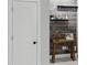 Hallway features stylish wall décor and a charming accent table at 113 Windy Creek Ln, Apex, NC 27502