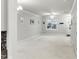 Bright, open-concept living room with fresh white walls at 113 Windy Creek Ln, Apex, NC 27502