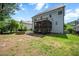 Fenced backyard with screened porch, patio, and fire pit at 1132 Heritage Knoll Dr, Wake Forest, NC 27587
