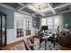 Elegant office space with glass doors, wainscoting, and coffered ceilings at 1132 Heritage Knoll Dr, Wake Forest, NC 27587